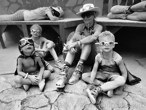 burning man - mom and her three dusty kids at center camp cafe, children, kids, mother, woman