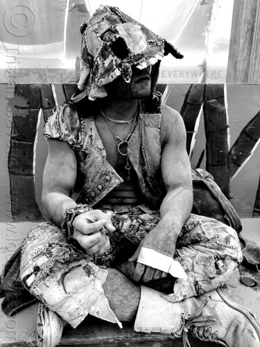 burning man - patchwork costume, man, patchwork, sitting