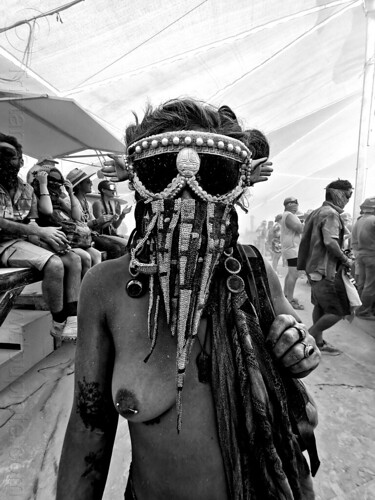 burning man - woman with decorated face mask at center camp cafe, attire, burning man outfit, decorated, face mask, goggles, nipple piercing