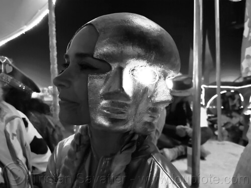 burning man - woman with mask with several faces, burning man at night, mask, woman