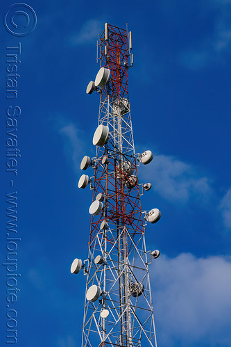 communication tower with microwave repeaters, communication tower, microwave repeaters