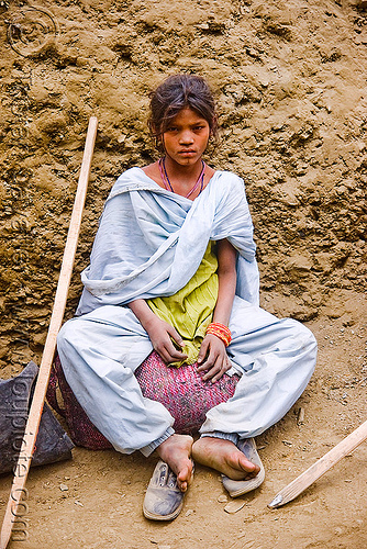 exhausted and dusty young girl resting on trail - pilgrim - amarnath yatra (pilgrimage) - kashmir, amarnath yatra, girl, hiking cane, hindu pilgrimage, indian woman, kashmir, mountain trail, mountains, pilgrim, resting, saree, sari, walking stick
