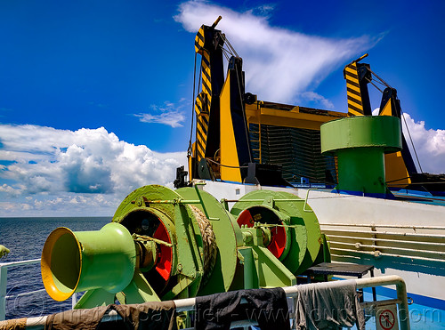 ferryboat winches and closed ramp, deck, exterior, ferry, ferryboat, horizon, ocean, outside, ramp, sea, ship, winches