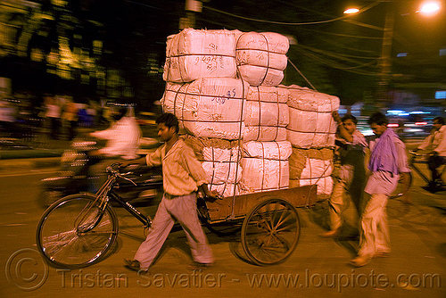 freight tricycle with heavy load of cargo - delhi (india), cargo tricycle, cargo trike, cycle rickshaw, delhi, freight tricycle, freight trike, load bearer, men, moving, night, wallahs