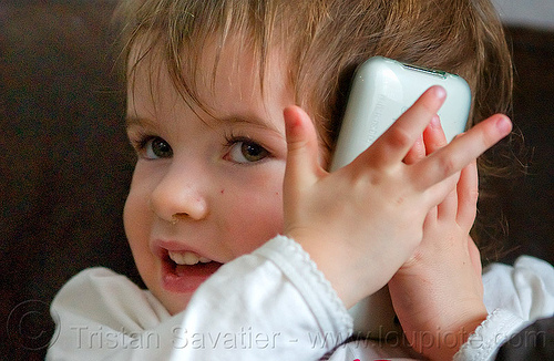 Kid With IPhone | Stock Photo #5391936112