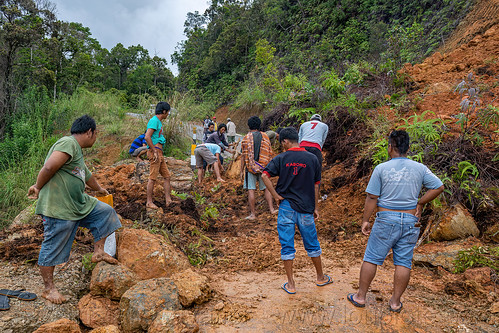locals clearing big landslide with hand shovels, bada valley road landslide, men, mountain road, road to bada valley, roadwork, working