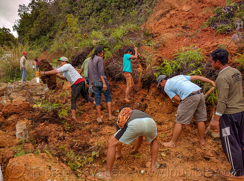 men clearing road landslide with hand shovels, bada valley road landslide, men, mountain road, road to bada valley, roadwork, working