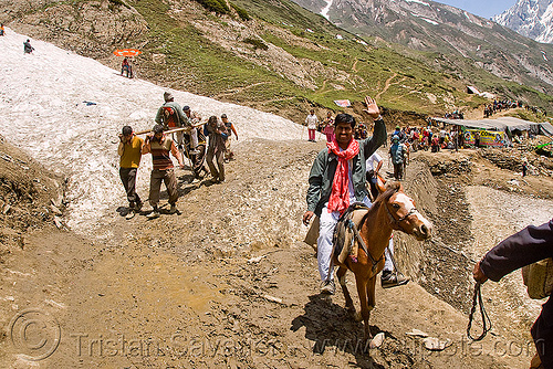 ponies and pilgrims on the trail - amarnath yatra (pilgrimage) - kashmir, amarnath yatra, glacier, hindu pilgrimage, horseback riding, horses, kashmir, kashmiris, load bearers, mountain trail, mountains, pilgrims, ponies, snow, wallahs