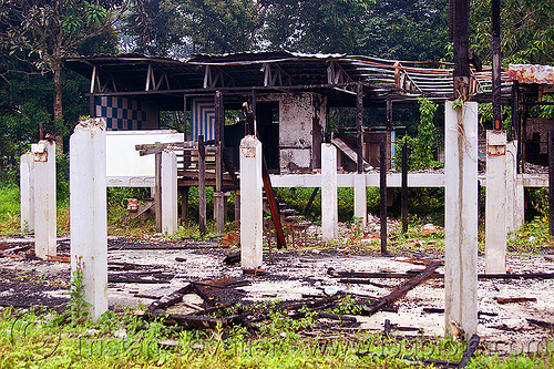 ruins of batu bungan village, batu bungan penan, borneo, burned down, columns, concrete, destroyed, destruction, gunung mulu national park, houses, longhouse, malaysia, pillars, ruins, village