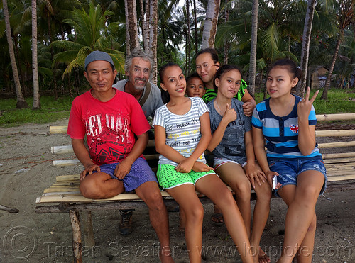 selfie with indonesian family - sulawesi island, bench, girls, man, selfie, sitting, women