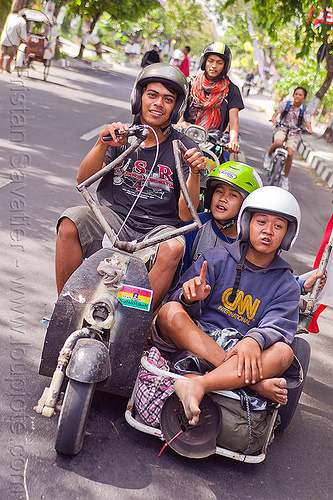 youngsters riding customized vespa sidecar, extreme vespa, motorbike helmets, motorcycle helmets, rider, riding, scooter, scrooter, sidecar, teenagers, teens, yougster, youngsters